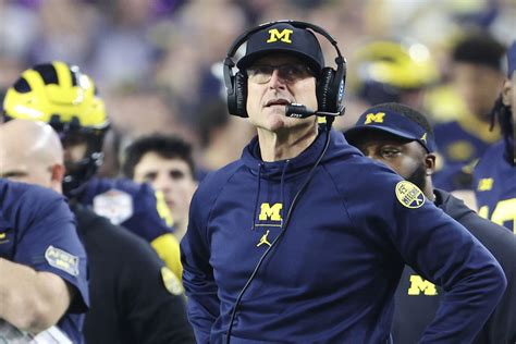 Michigan coach Jim Harbaugh facing 4-game suspension for breaking NCAA rules, AP source says